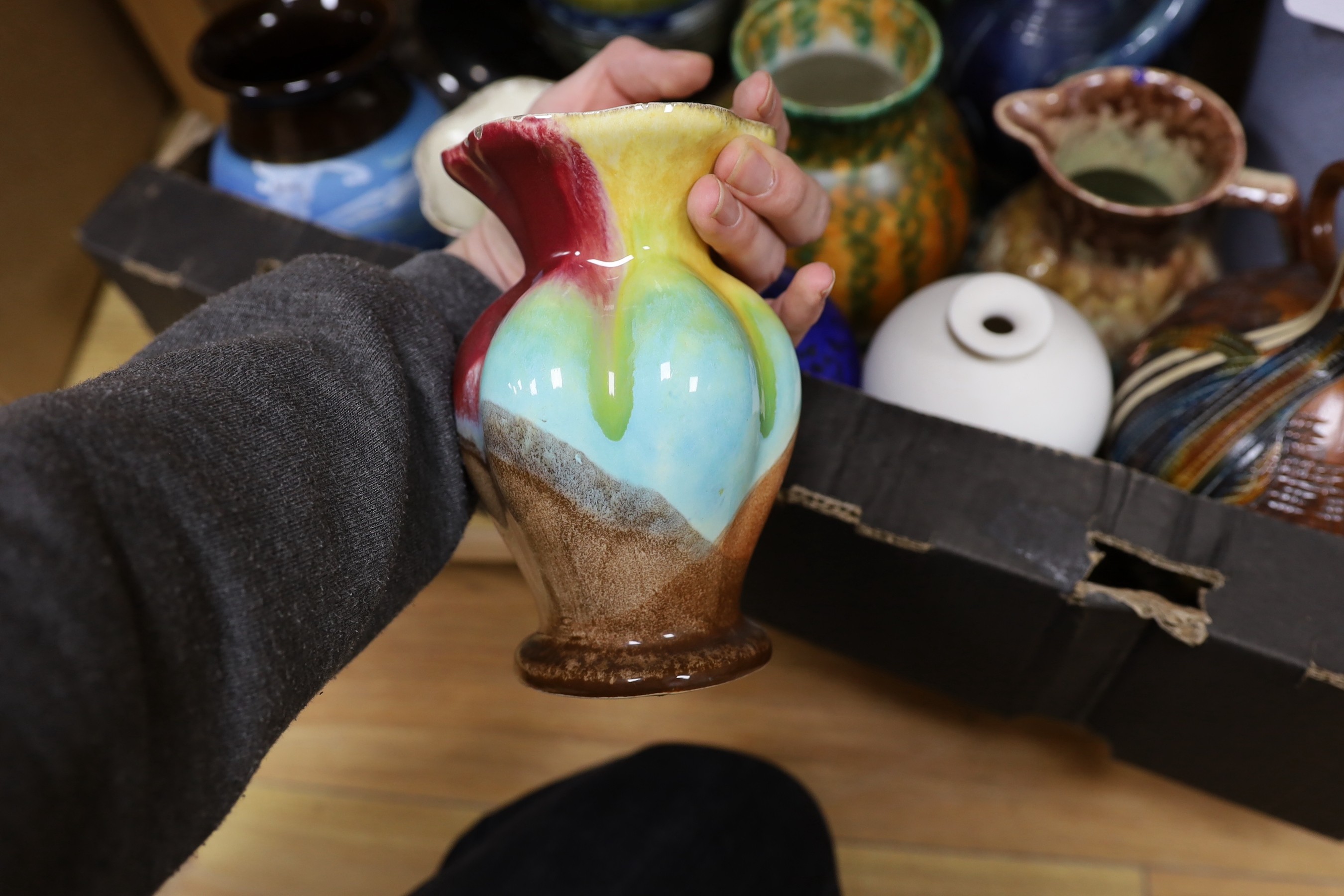 A collection of mixed continental pottery vases